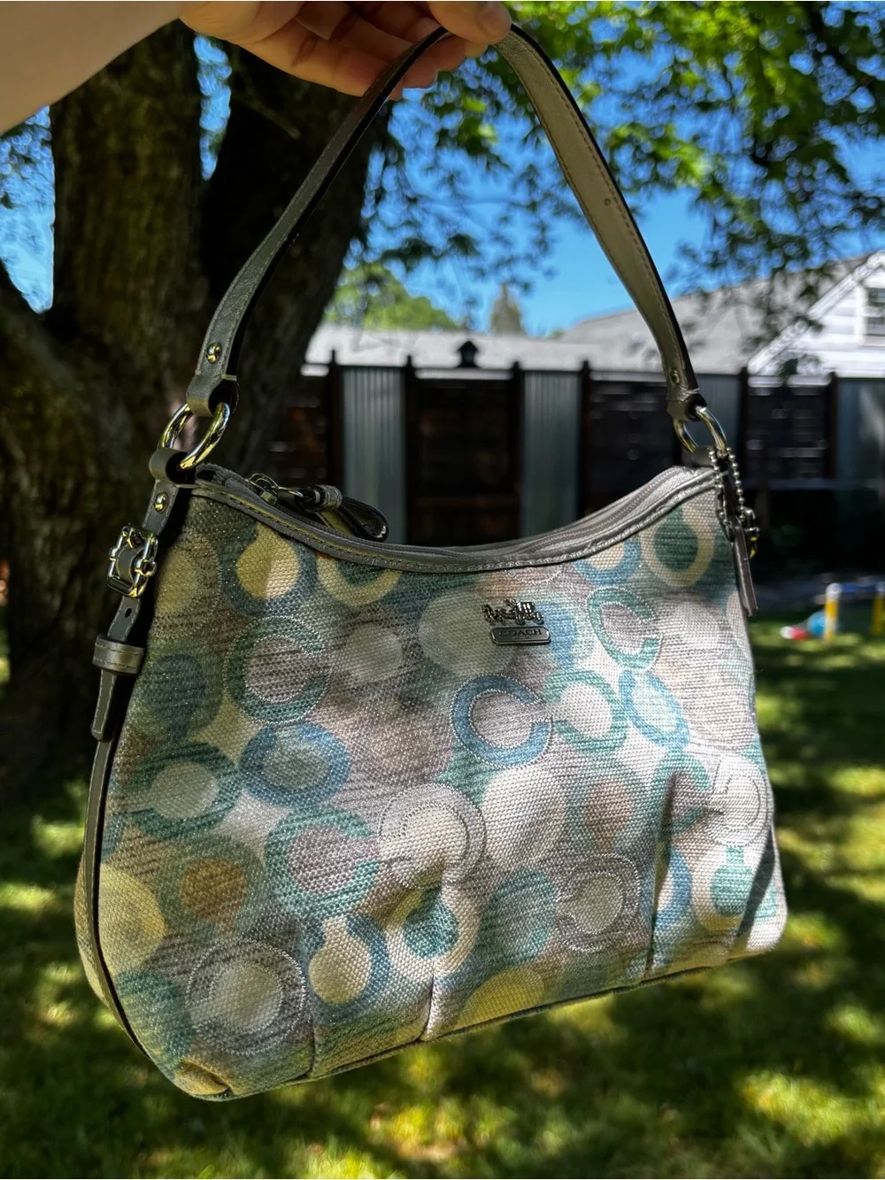 Coach baguette shoulder bag featuring a multicolored 